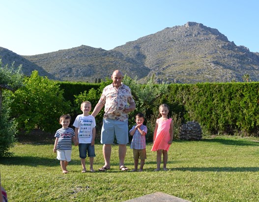 Dad with grandchildren (l to r, James, Ben, Lucas, Tegan)