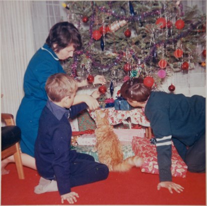 Muriel with Phil, Ralph, and Waddles the cat, circa 1970