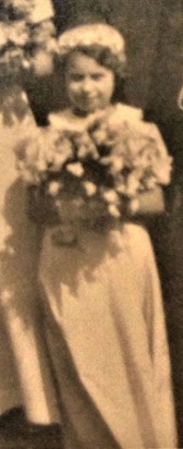 Muriel circa 1938, at her sister's wedding