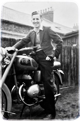 Proud John with his Excelsior motor bike