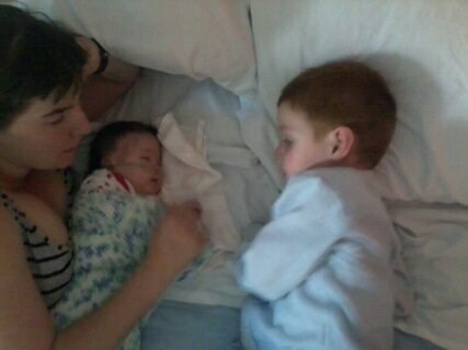 having a snooze with mama and Kayden