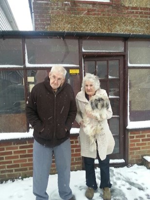 Mr and Mrs Chard in the snow with Fifi 