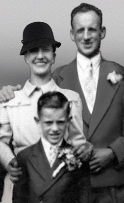 Eddie with his Mum & Dad at a wedding