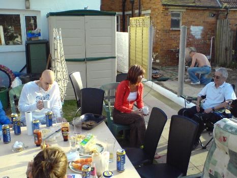 Jamie at BBQ, Tracey in red