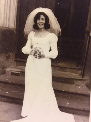 mum in wedding dress