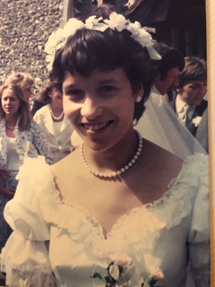 Always smiling, beautiful Jo on her wedding day. 