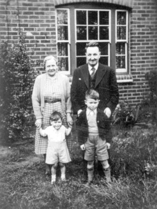 Grandma and Grandfather Brinnen with Malcolm and Nevil. 