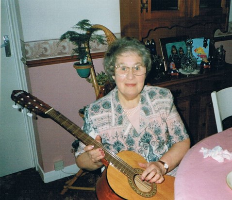 Sheila playing guitar