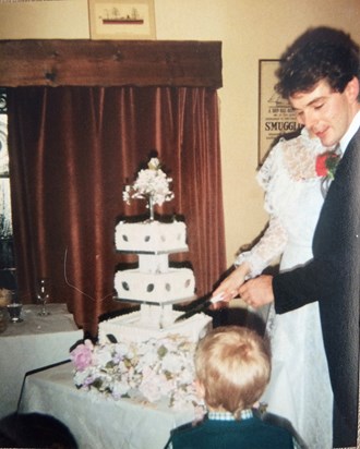 Nigel 1985 cutting his wedding cake with Ben