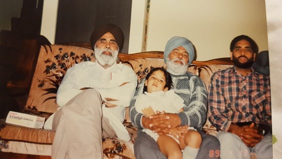 Baba with his brother, nephew and grand daughter Navi