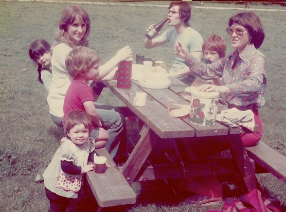 Our families picnicking in the park (1979)