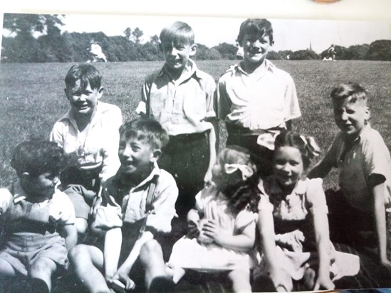 Gerard with his big brothes Frank & Des & big sister Trish & wee cousin Helen & friends.