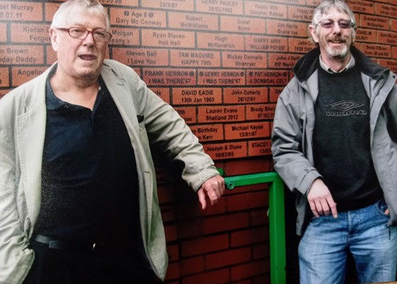 Frank and Gerry at Celtic Park with their bricks. 