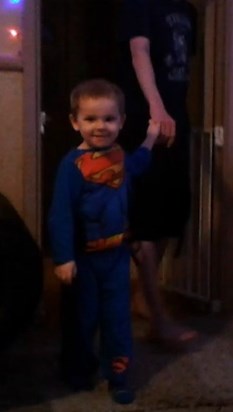 Our little superman on Christmas Morning 2014