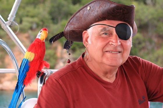 Pirate Bassett and his trusty parrot sailing round Treasure Island in the BVI