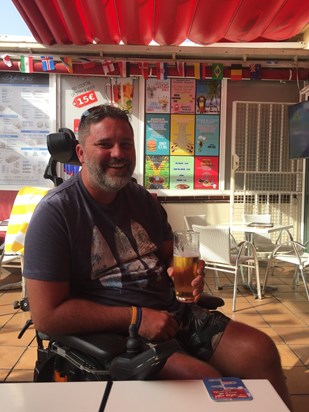Dean watching the Football World Cup in the Sun