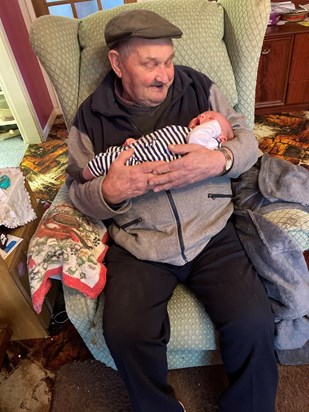 Cuddles with great granddad 