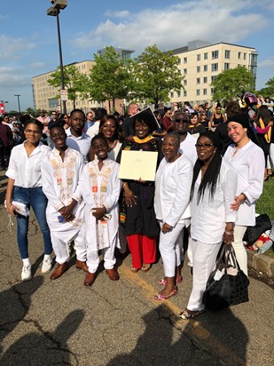 Sidney with family at Annie’s graduation 