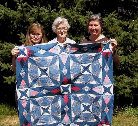 Sue, Christine and Kathy with squares Christine sewed