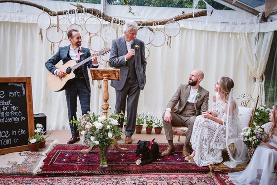 John singing at our wedding