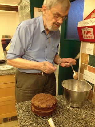 making a cake for his beloved family