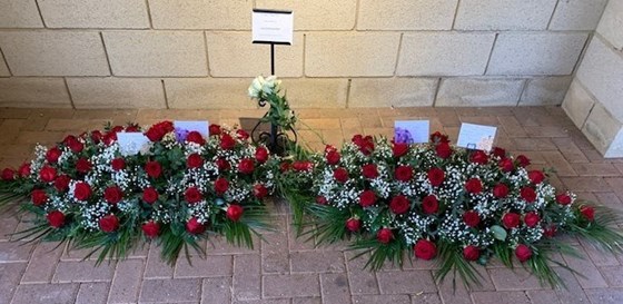 Floral tributes for Joan and Richard Bird