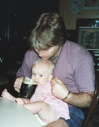 1992/3 In Australia with niece Alice giving her a first taste of Guinness!!