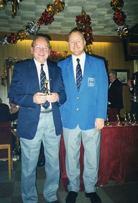 Dad with a golfing trophy