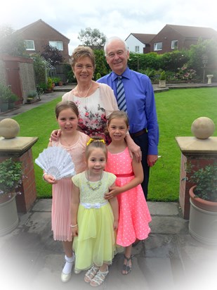 Duncan & Sue with their 3 grandaughters.