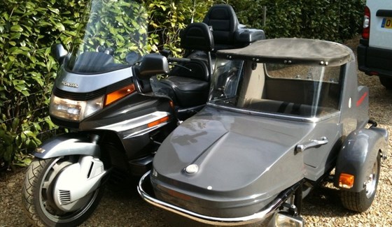 I bought Conrad’s Goldwing off him 10 years ago & I still own it.Andy Rayment.