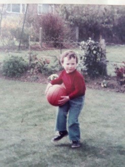 As a budding young footballer!