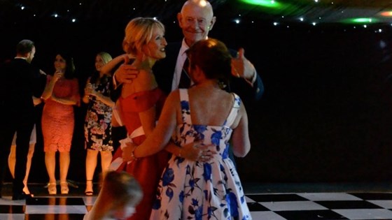 having the time of his life dancing with 2 lovely ladies-Laura and Paula!