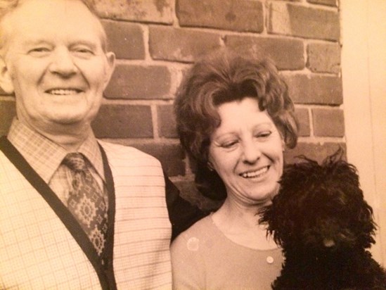 Joyce and her husband Jim... And beloved poodle 
