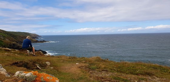 Taking in the view after a coastal walk.