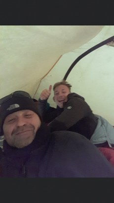 Kris all happy after eating rubbish sweets, despite being in a cold wet tent at Base camp 4.x