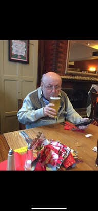 Enjoying his favourite pint