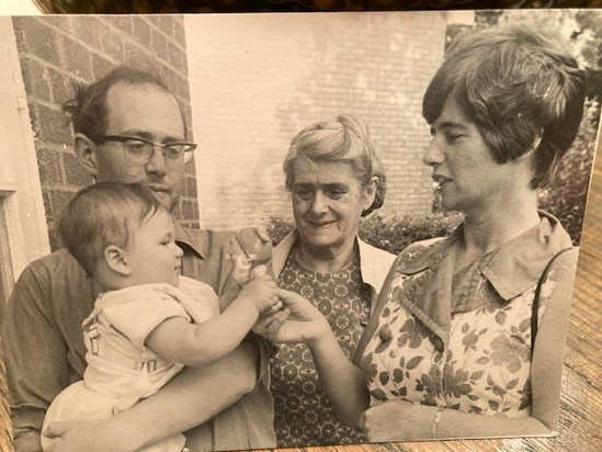 Awarding the booby prize in Ware's bonniest baby competition - with cousin Ian and mother Marjorie