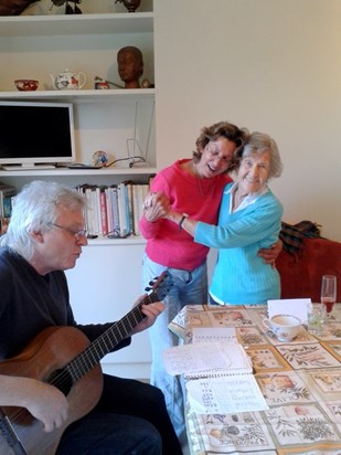 Doris and Josephine enjoying Tony's musical talents