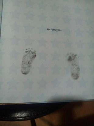 Ian's tiny foot prints so precious