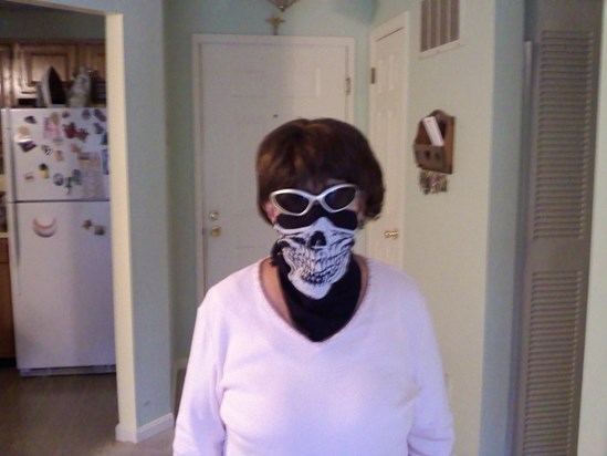 Mom wearing my motorcycle gear trying to be cool!!