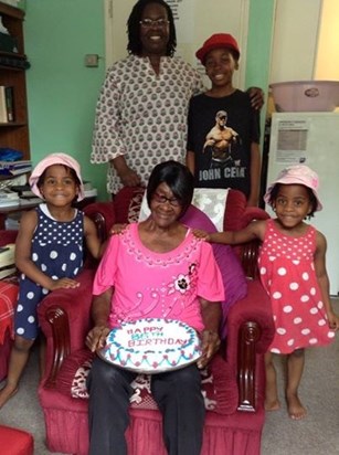 Mom cebrating her 86th birthday with her adopted grand-children and daughter Yvonne 2013