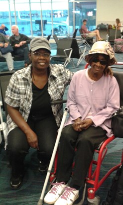 Mom and her daughter Yvonne At Atlanta, Georgia airport in transit to london  from Texas 