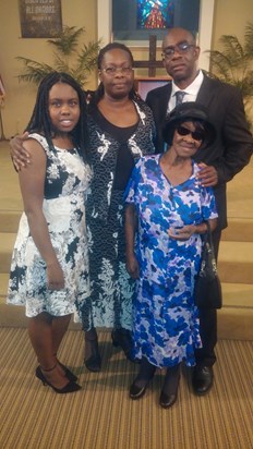 Mom and her grand-daughter Kristelle, her daughter Yvonne, and her son Dudley at the home-going ceremony for Dudley's wife Ava in 2017