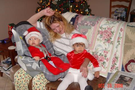 Grace loved her nieces and nephew. This is Grace with little Ian and Leana at Christmas 2006