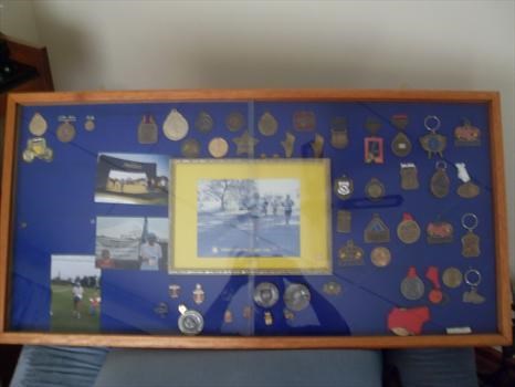 Dad's pride - medals received for competing in marathons
