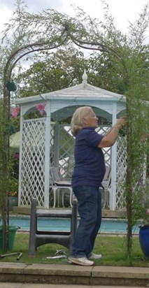 Mary Ann creating a beautiful flower arch on the morning of our wedding at Swallows xx