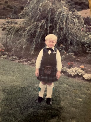 Wearing his first kilt