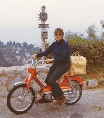 Kelly when she lived in Menton, France -- on her vespa, wine in bag for sure : )