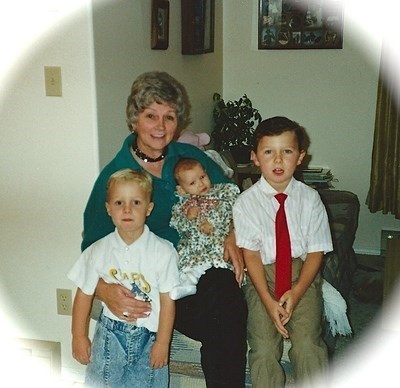 Joan with her three Grandchildren