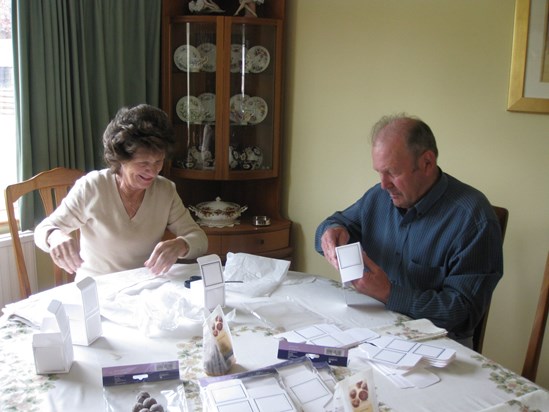 Dorothy and Stan preparing the Gift Boxes for Tina and Cat's wedding.